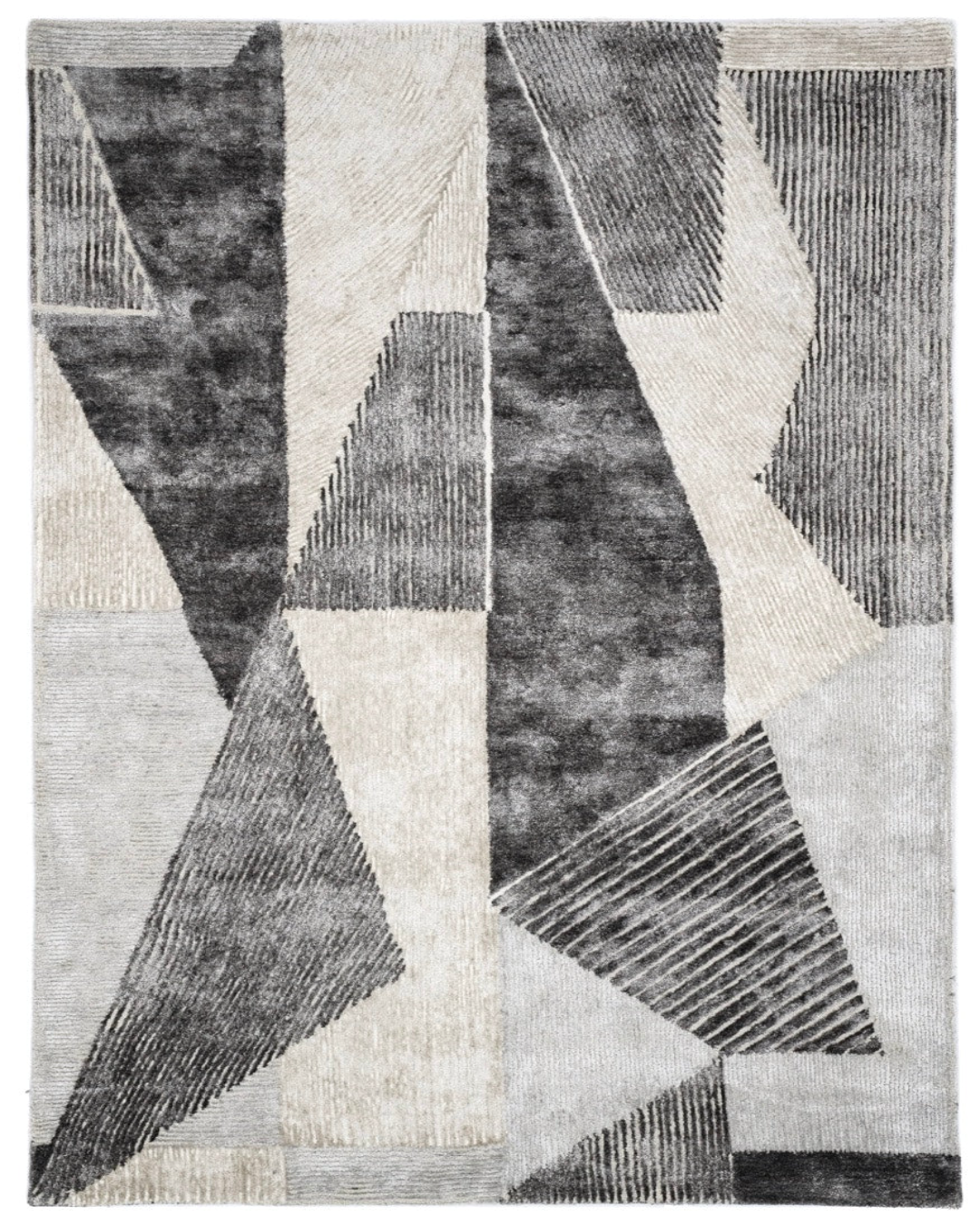 Cava Wool & Silk Rug featuring a bold geometric design, hand-tufted for durability and soft texture, perfect for modern interiors.